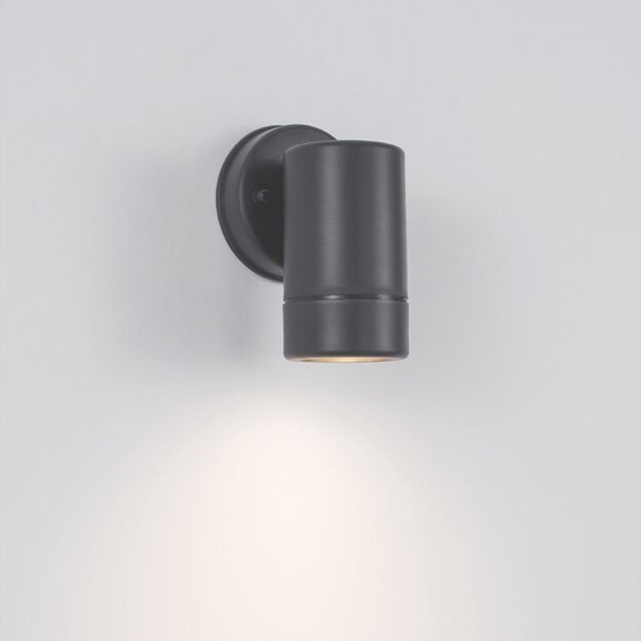 Our Valentine dark grey outdoor single spot cylinder wall light would look perfect in a modern or more traditional home design. Outside wall lights can provide atmospheric light in your garden, at the front door or on the terrace as well as a great security solution. It is designed for durability and longevity with its robust material producing a fully weatherproof and water resistant light fitting.  Use LED bulbs to make this light energy efficient and low cost to run.