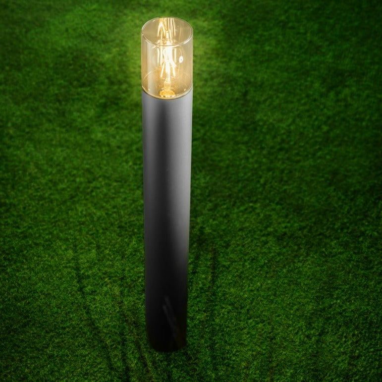 This post light is featured with a smoky diffuser, dark grey finish and ideal for outdoor use. Measuring around 50cm in height, this elegantly designed pillar light blends with either modern or traditional houses. The extended height of this product (compared to our medium dark grey post light) allows it to show off its features better. 