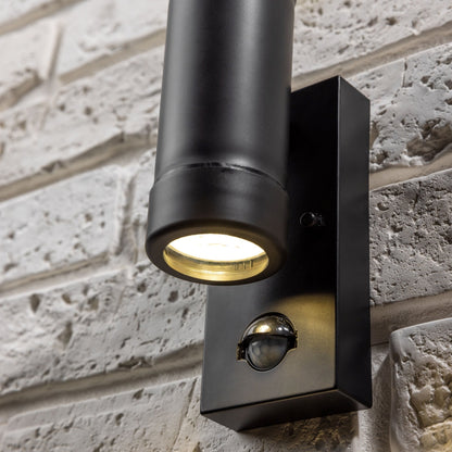 Our Valentine black outdoor wall mounted up and down cylinder outdoor light with motion sensor would look perfect in a modern or more traditional home design. Outside wall lights can provide atmospheric light in your garden, at the front door or on the terrace as well as a great security solution.