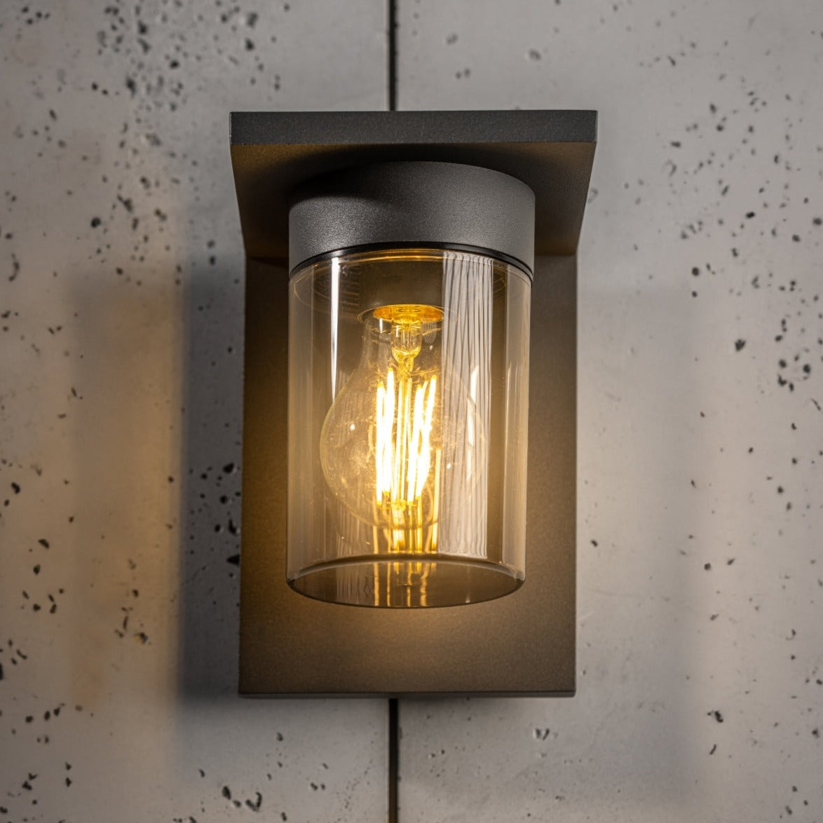 If you’re looking for a modern take on a traditional outdoor wall light, this&nbsp;anthracite wall light is perfect for adding style and protection for your home. This classic design with a contemporary twist, styled with a metal square shape and fitted with a smoked cylinder diffuser that allow the light to shine effectively