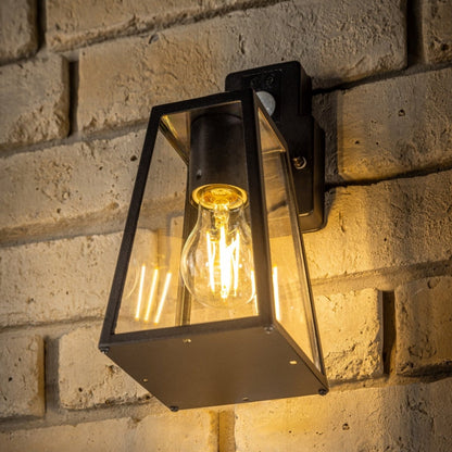 If you’re looking for a modern take on a traditional outdoor wall light, this black aluminium triangular wall light is perfect for adding style and protection for your home. This classic design with a contemporary twist, styled with a metal triangle shape and fitted with clear diffusers<span style="font-weight: 400;" data-mce-fragment="1" data-mce-style="font-weight: 400;"> also contains an imposing black finish, making it ideal for any home design - adding a statement to any wall it fits in</span>