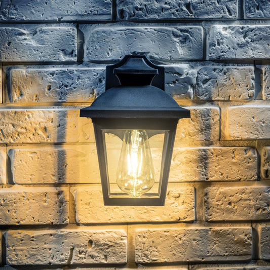 Our Hope lantern wall light delivers on style and durability and is a smart choice for your exterior lighting. With its black polycarbonate construction teamed with polycarbonate panes, this lantern is hardwearing and rust and weatherproof. Built for life outdoors, it has an IP44 rating which means it can withstand the harshest of weather conditions. For sophisticated yet robust outdoor lighting, our Yasmin black outdoor traditional lantern is a strong contender.