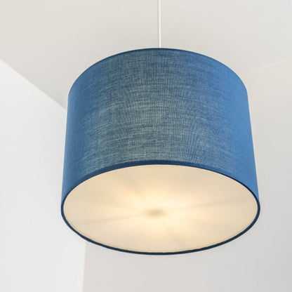 The Lucia is a modern cylinder drum shaped lamp shade in a luxury cotton finish and white opal diffuser. This fantastic shade can double up as either a ceiling pendant light shade or table lampshade. Easily fits to your standard ceiling light socket - no wiring required.