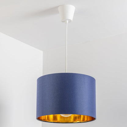 Our Lupo luxury cotton shade is sophisticated in appearance and we have designed the shade to suit a range of interiors. Easy to fit, it’s crafted from high-quality cotton on the outer and has a reflective gold metallic inner. It's made to fit both a ceiling light or lamp base.