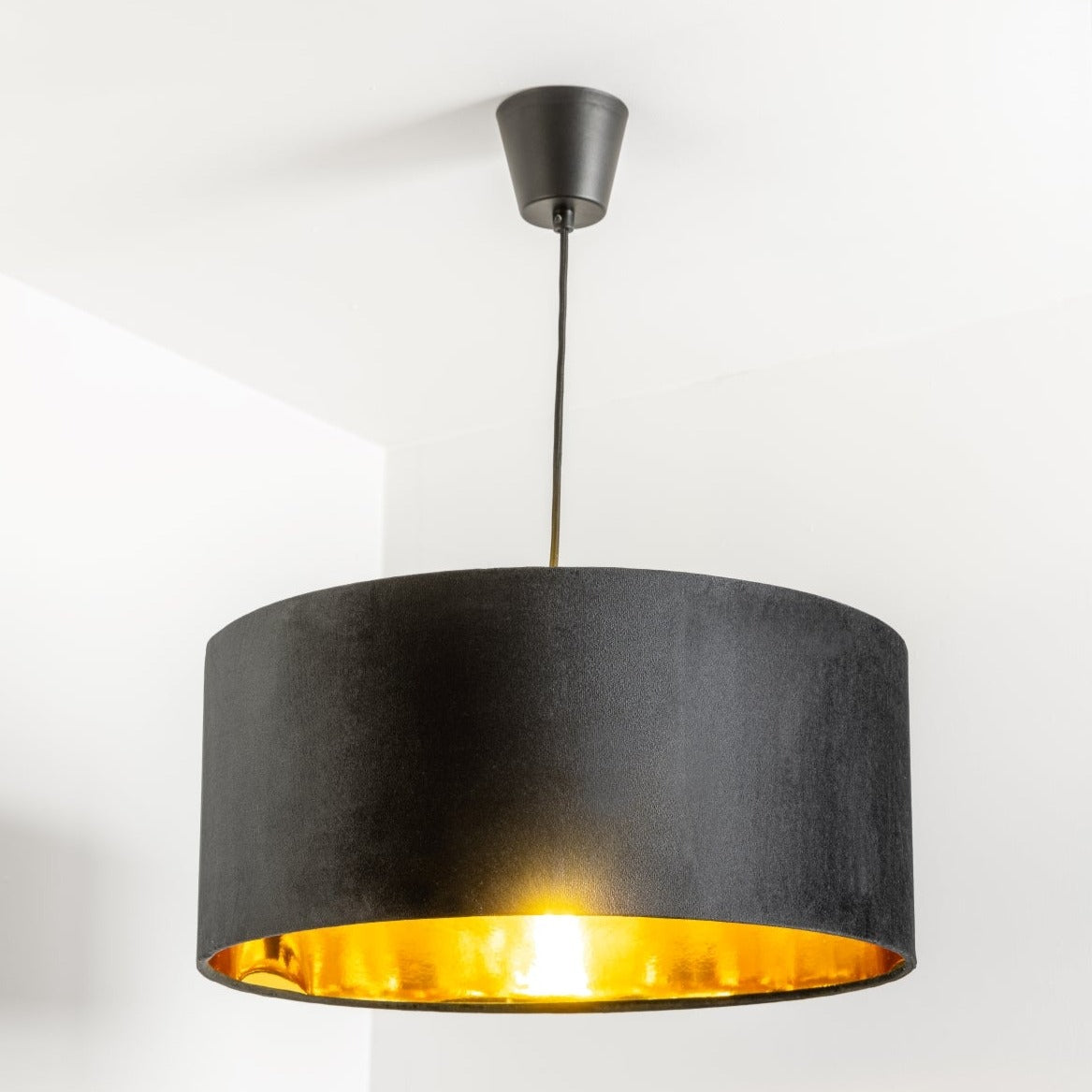 Our stunning oversized Milano Lamp shade offers a timeless update to any room. The outer is made from high-quality velvet and the lining is reflective gold for a stylish finish. It’s easy to install and will instantly transforms your ceiling fitting, table or floor lamp. Simply attach to an existing light fitting or lamp base for an instant glow up.