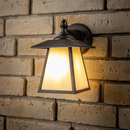 If you’re looking for a modern take on a traditional outdoor wall light, this black aluminium triangle wall light is perfect for adding style and protection for your home. This classic design with a contemporary twist, styled with a metal triangle shape and fitted with opal diffusers also contains an imposing black finish