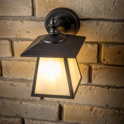 If you’re looking for a modern take on a traditional outdoor wall light, this black aluminium triangle wall light is perfect for adding style and protection for your home. This classic design with a contemporary twist, styled with a metal triangle shape and fitted with opal diffusers also contains an imposing black finish