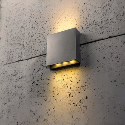 Our Sian dark grey anthracite outdoor wall mounted rectangle outdoor light would look perfect in a modern or more traditional home design. Outside wall lights can provide atmospheric light in your garden, at the front door or on the terrace as well as a great security solution. It is designed for durability and longevity with its robust material producing a fully weatherproof and water resistant light fitting making it suitable for coastal areas.