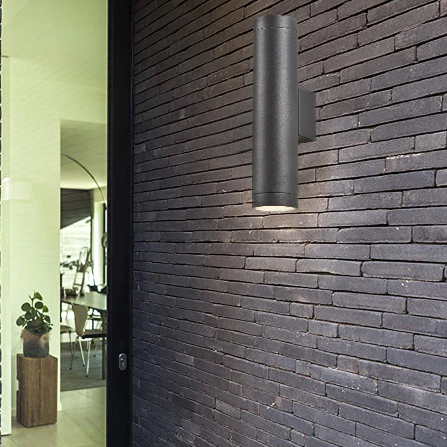 Our Lucas grey anthracite extra long outdoor wall mounted up and down cylinder outdoor light would look perfect in a modern or more traditional home design. Outside wall lights can provide atmospheric light in your garden, at the front door or on the terrace as well as a great security solution. It is designed for durability and longevity with its robust material producing a fully weatherproof and water resistant light fitting.