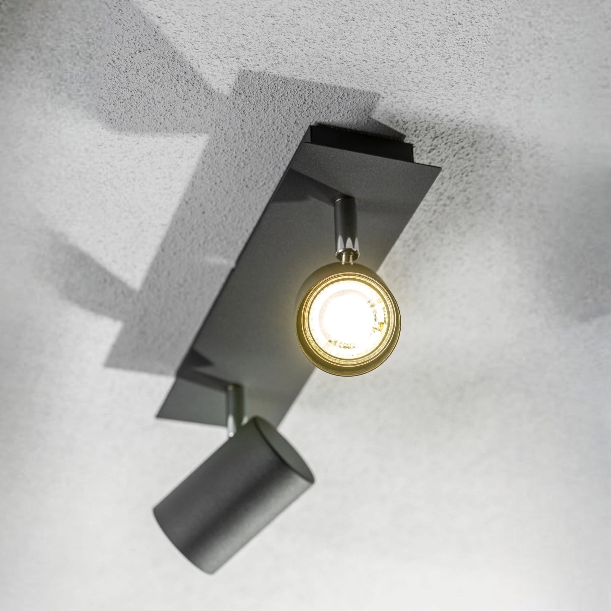 Add an industrial style to your home with the VENETO  spotlight light finished in white. The lamp is also ideal for task lighting due to the adjustable heads providing a focused beam. The simplistic design of this light fitting makes it suitable for all interior styles.