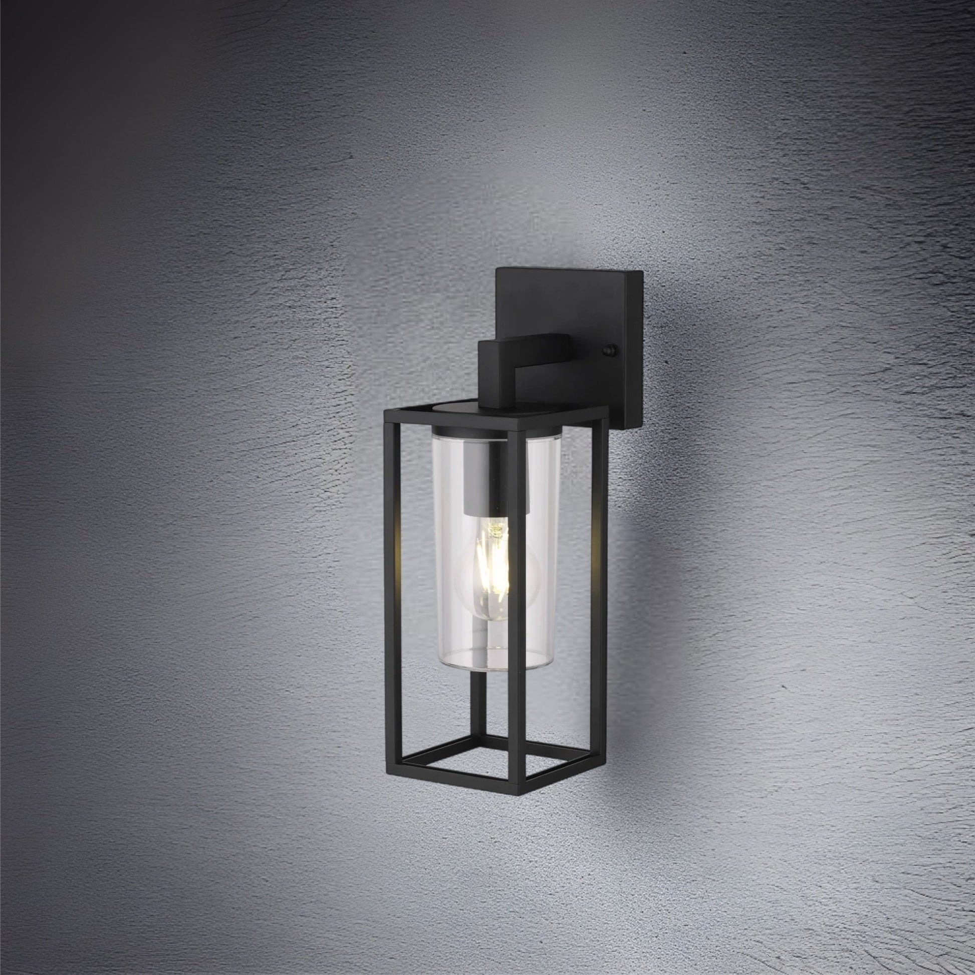 If you’re looking for a modern take on a traditional outdoor wall light, this black lantern  wall light with clear diffuser is perfect for adding style and protection for your home. This classic design with a contemporary twist, styled with a metal lantern shape and fitted with a cylinder diffuser that allows the light to shine effectively.  This product also contains an imposing black finish, making it ideal for any home design