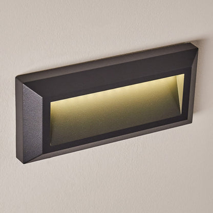 Our Rebecca LED slim dark grey outdoor wall light would look perfect in a modern or more traditional home design. Outside wall lights can provide atmospheric light in your garden, at the front door or on the terrace as well as a great security solution. It is designed for durability and longevity with its robust material producing a fully weatherproof and water resistant light fitting. LED which means its low cost to run.