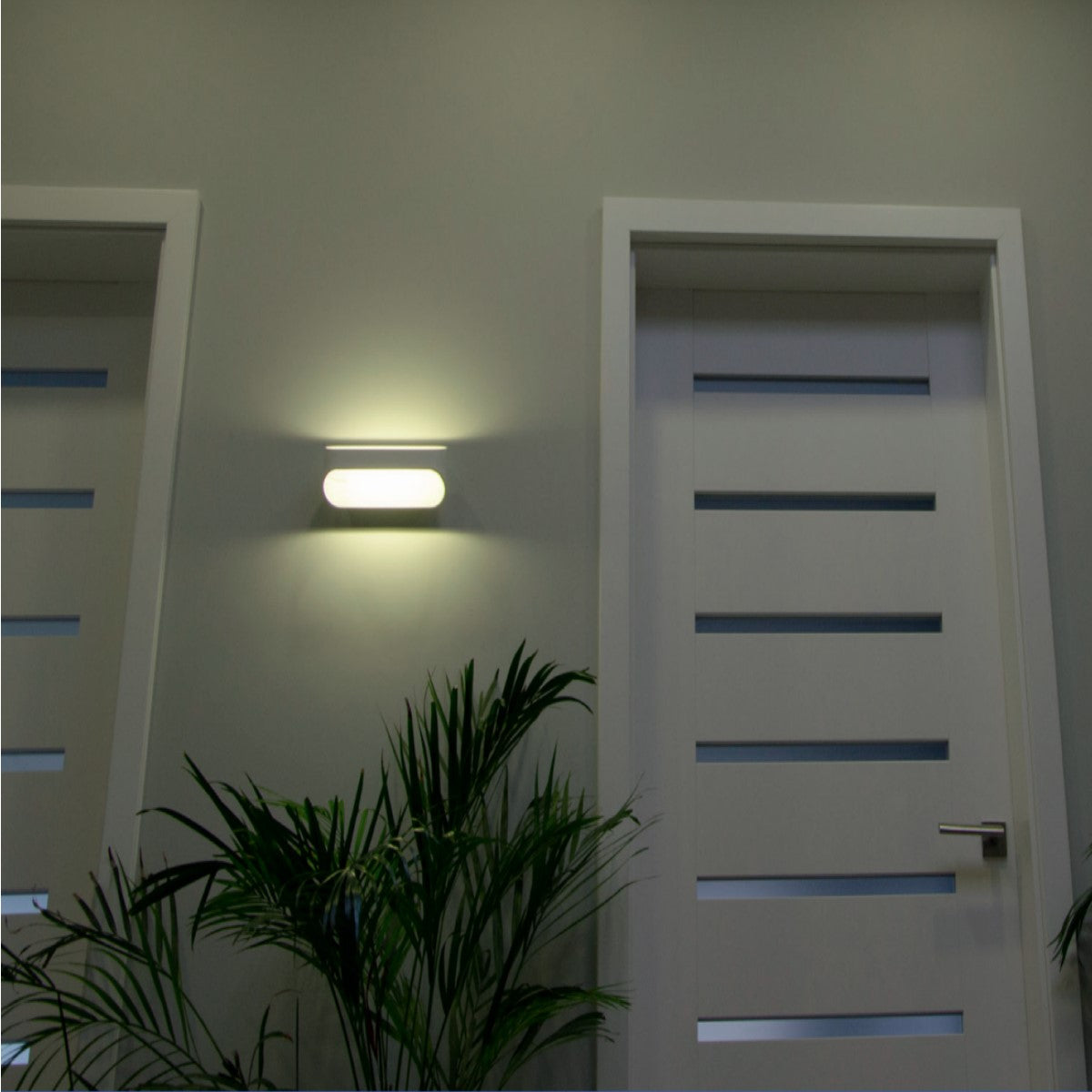 Our Ace LED white up and down wall light is the perfect lighting solution for your homes and spaces. With its modern design its both stylish and practical. This wall light would look perfect in a modern or more traditional home design.