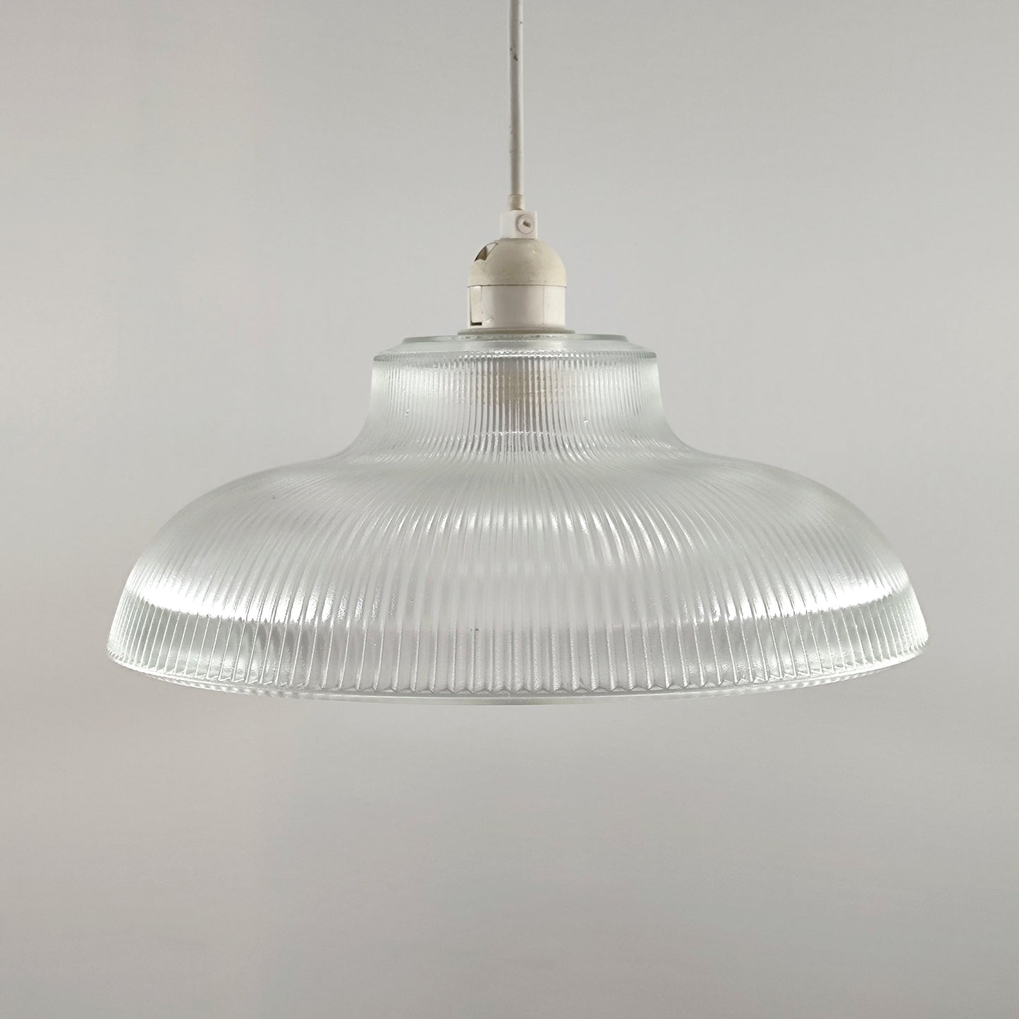 Glass lighting has proven very popular in the lighting sector, and we are extremely happy to introduce the Jacinta to our range. Our ribbed glass easy fit light pendant is a very attractive light fitting and easy fit means you can give your room a makeover by simply attaching it to an existing light fitting. 