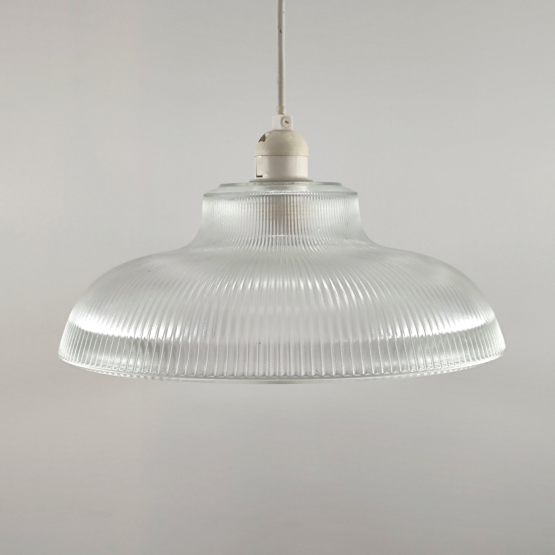 Glass lighting has proven very popular in the lighting sector, and we are extremely happy to introduce the Jacinta to our range. Our ribbed glass easy fit light pendant is a very attractive light fitting and easy fit means you can give your room a makeover by simply attaching it to an existing light fitting. 