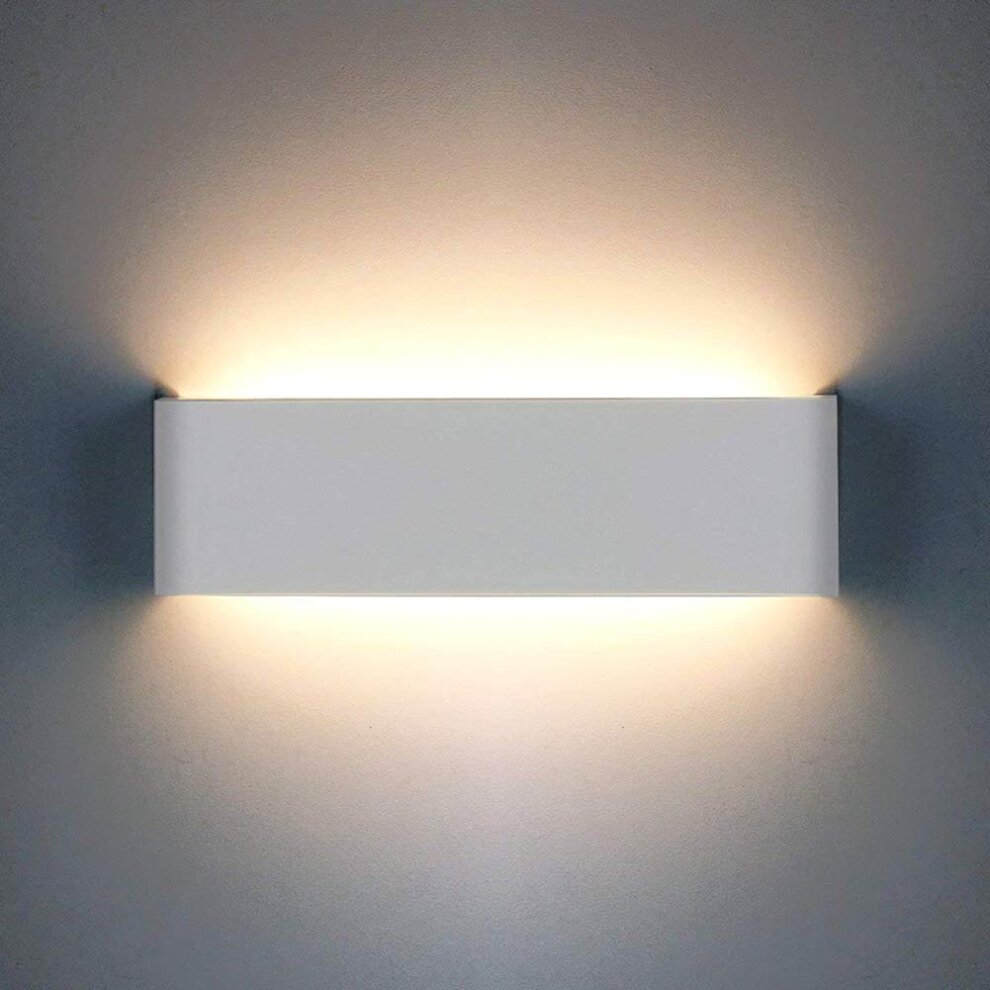 Our Ace LED white up and down wall light is the perfect lighting solution for your homes and spaces. With its modern design its both stylish and practical. This wall light would look perfect in a modern or more traditional home design.