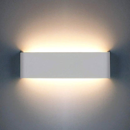 Our Ace LED white up and down wall light is the perfect lighting solution for your homes and spaces. With its modern design its both stylish and practical. This wall light would look perfect in a modern or more traditional home design.