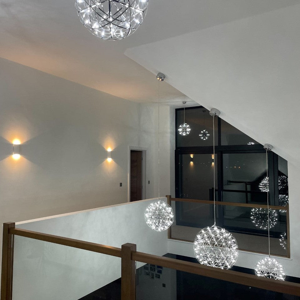  Our striking 60cm XL silver starburst light is the perfect way to make a statement with your interiors. It is inspired by elements of the night sky, comprising of a delicately crafted stainless steel round spherical shape and perfectly finished in LED lights This LED starburst sparkle pendant light will create a talking point in any space and can be placed together with the other size starburst lights to create something truly spectacular